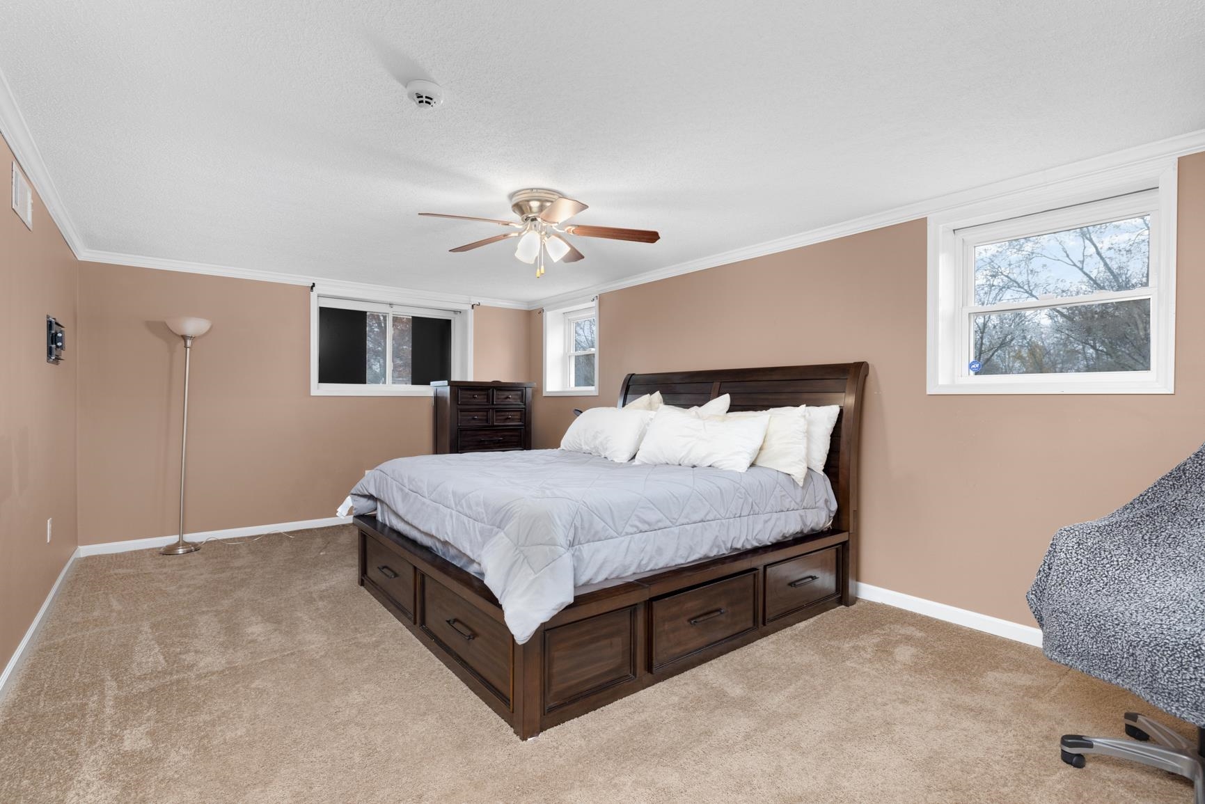 5466 Highway 59 Covington, TN 38019 - Photo 21 of 36 Bonus room featuring light colored carpet, ornamental molding, and a ceiling fan