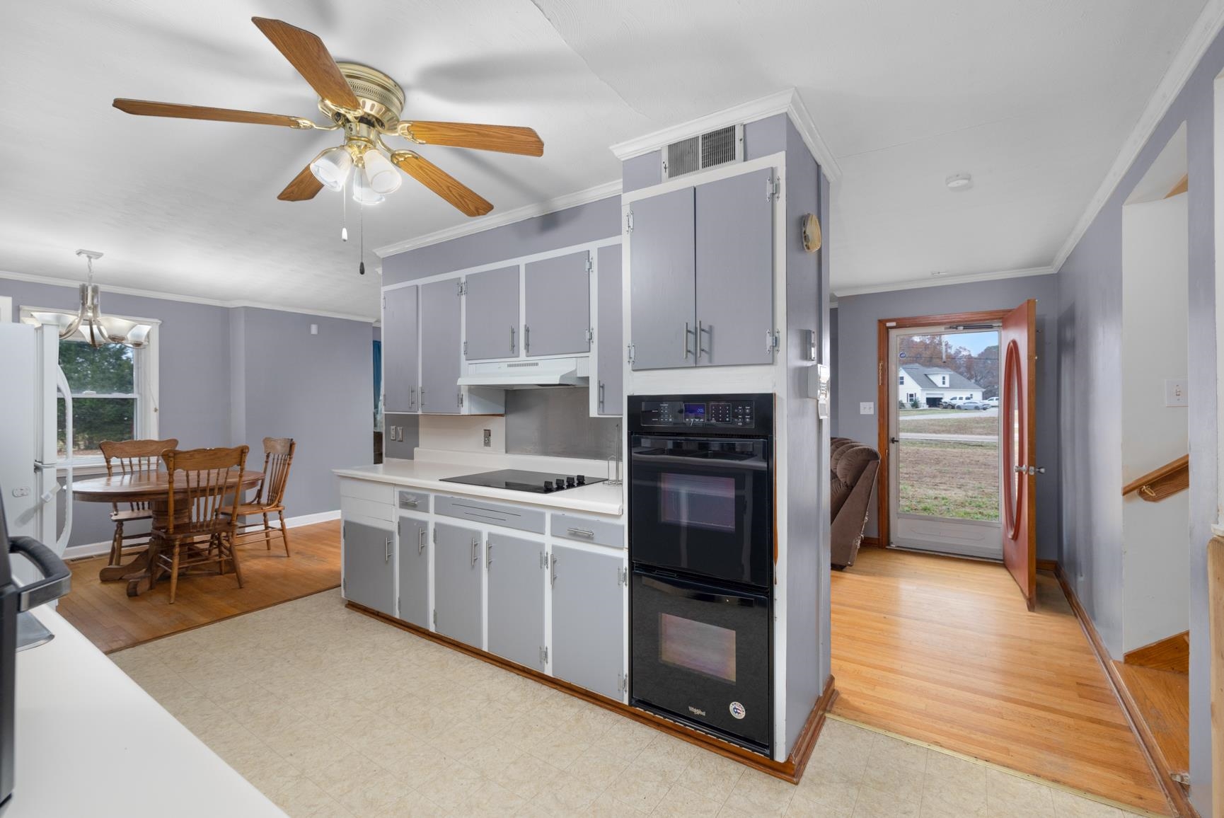 5466 Highway 59 Covington, TN 38019 - Photo 35 of 36 a kitchen with a stove cabinets and a refrigerator