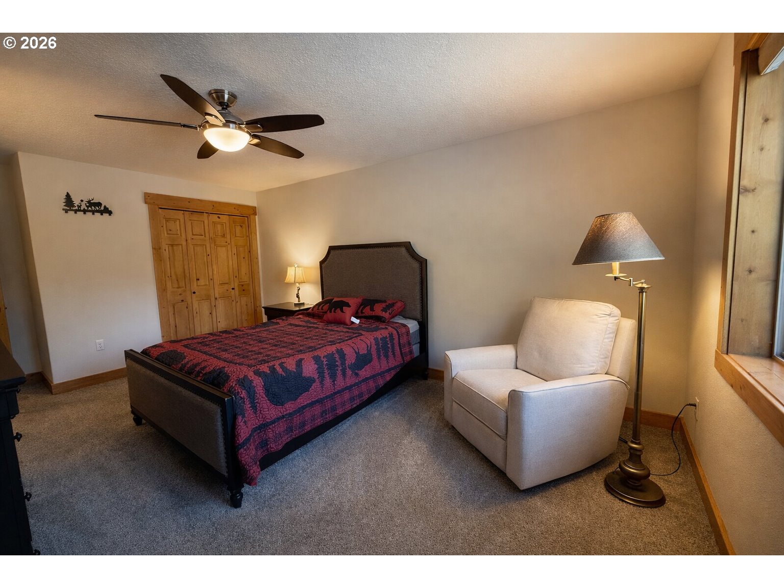 125 Melgard Court Detroit, OR 97342 - Photo 22 of 25 a bedroom with a bed and window