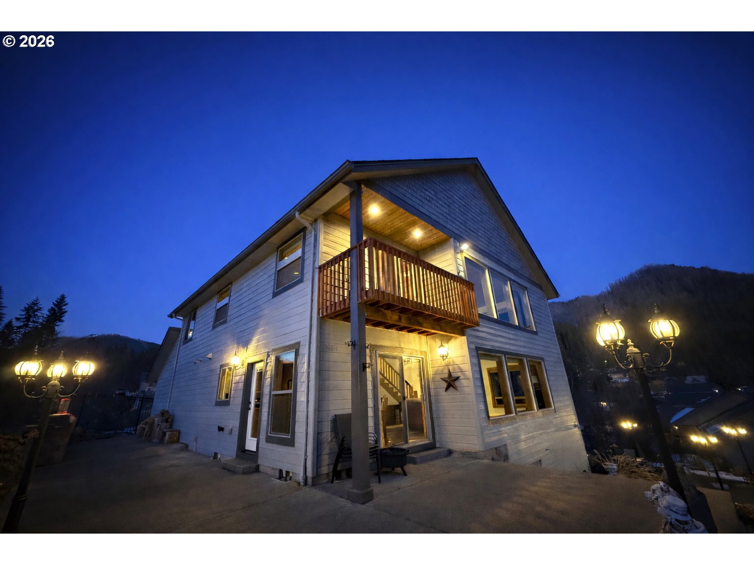 125 Melgard Court Detroit, OR 97342 - Photo 3 of 25 a view of a house with a swimming pool