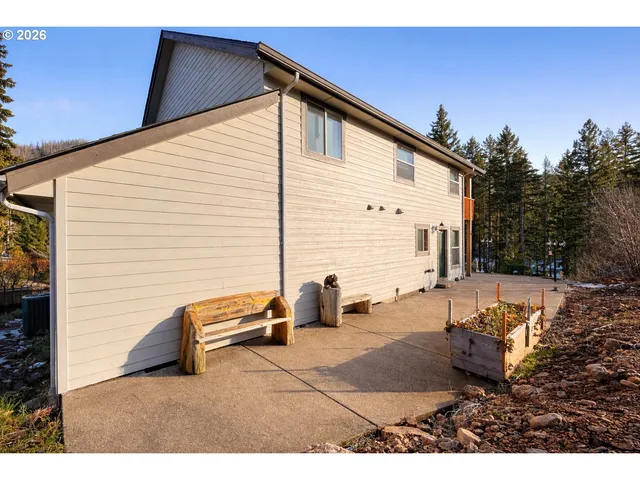 a backyard of a house with seating space