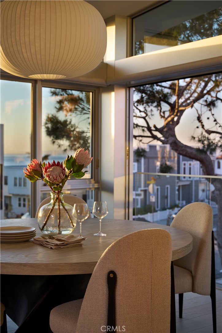 316 24th Street Hermosa Beach, CA 90254 - Photo 6 of 19 a view of a dining room with furniture and a window