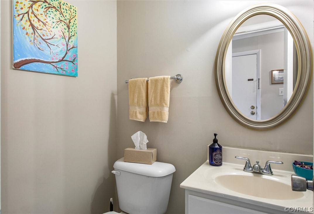 11629 East Briar Patch Drive Midlothian, VA 23113 - Photo 16 of 27 a bathroom with a toilet and a mirror