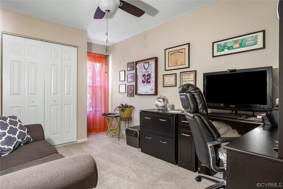 11629 East Briar Patch Drive Midlothian, VA 23113 - Photo 23 of 27 a livingroom with workspace and a couch