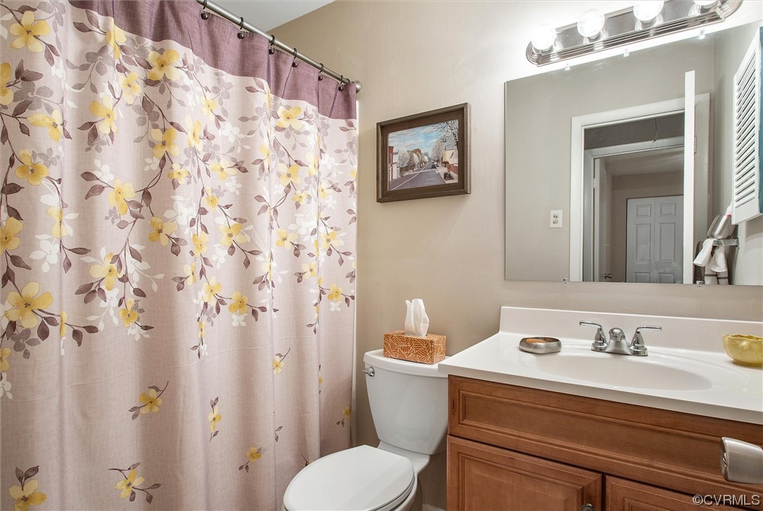 11629 East Briar Patch Drive Midlothian, VA 23113 - Photo 24 of 27 a bathroom with a sink toilet and shower
