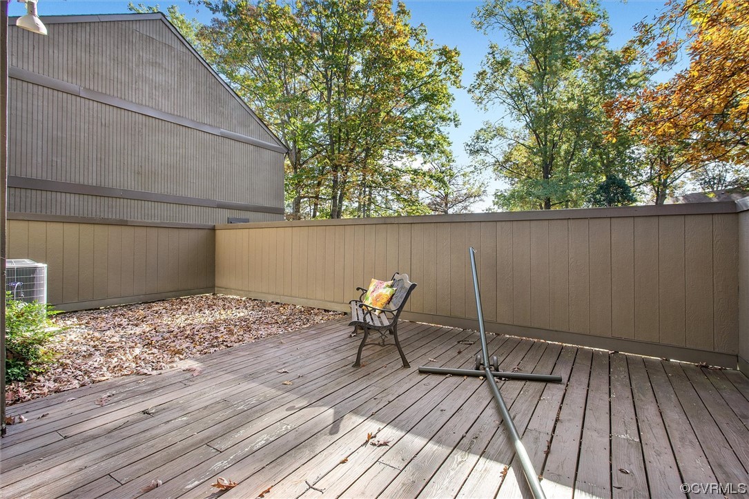 11629 East Briar Patch Drive Midlothian, VA 23113 - Photo 26 of 27 a backyard of a house with table and chairs