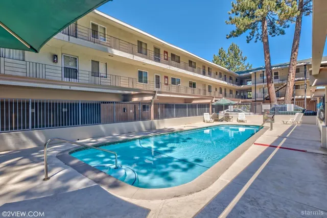 a view of a house with a swimming pool