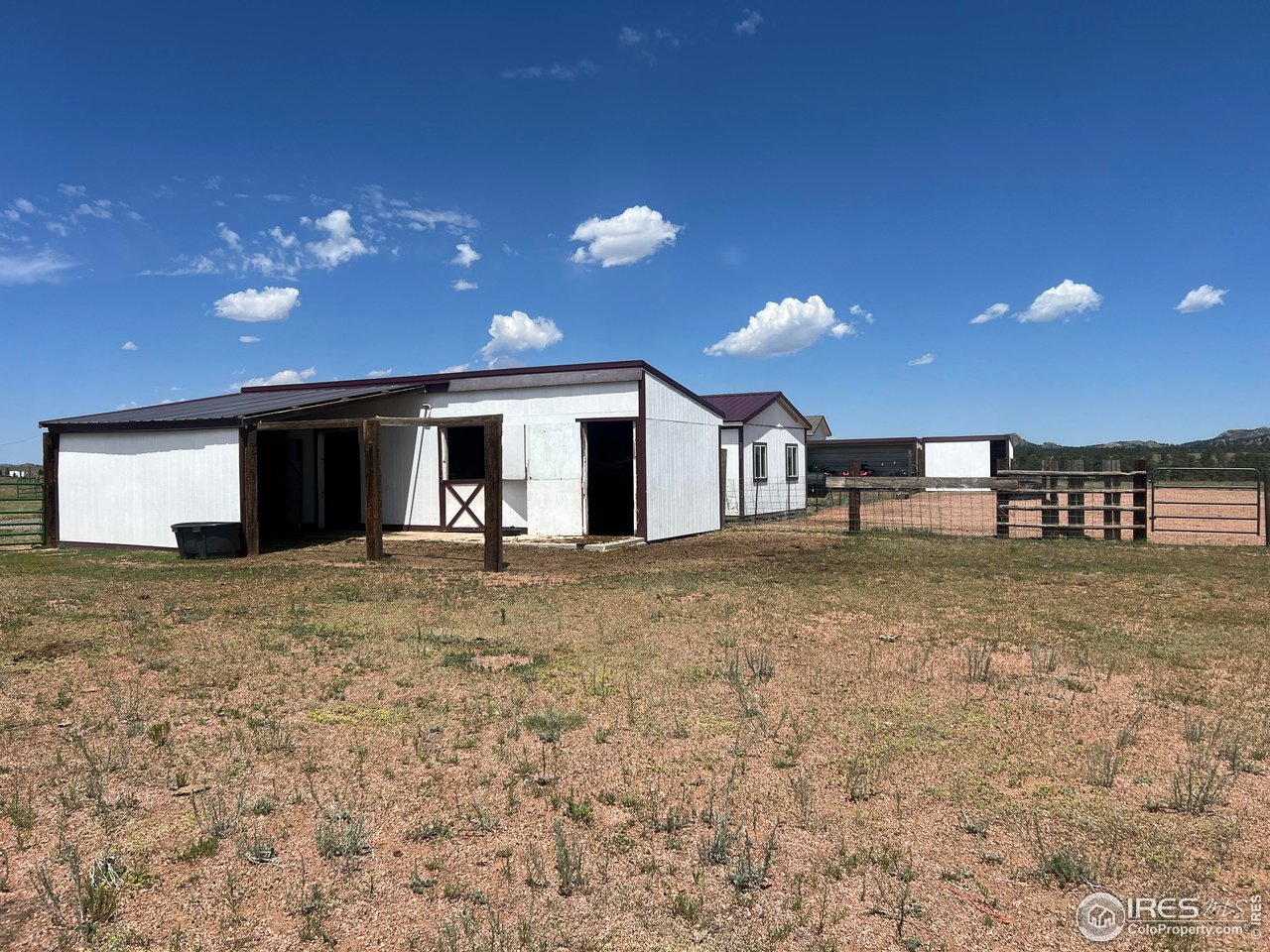 188 Old Ranch Road Livermore, CO 80536 - Photo 31 of 40 Barn with shelter, stalls, hay storage