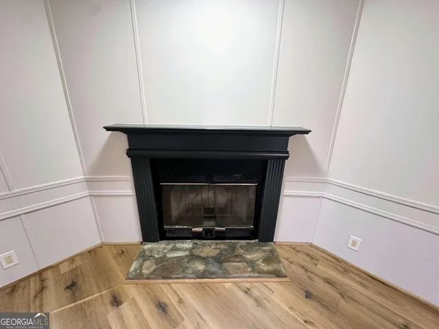 a living room with a fireplace