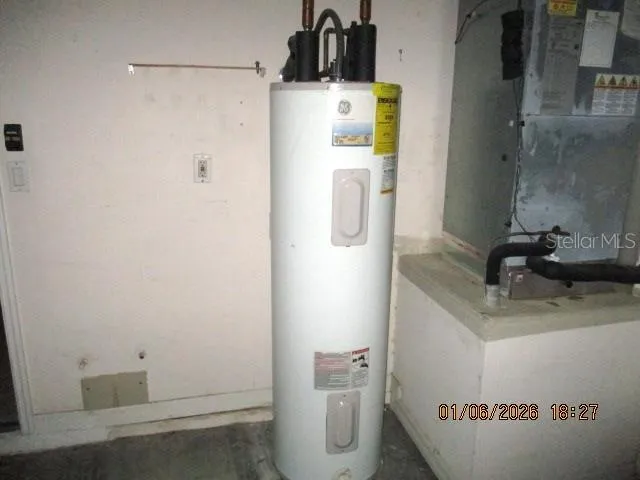 a bathroom with a sink mirror and vanity