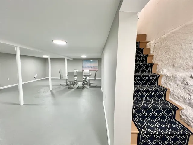 a view of a living room and entryway