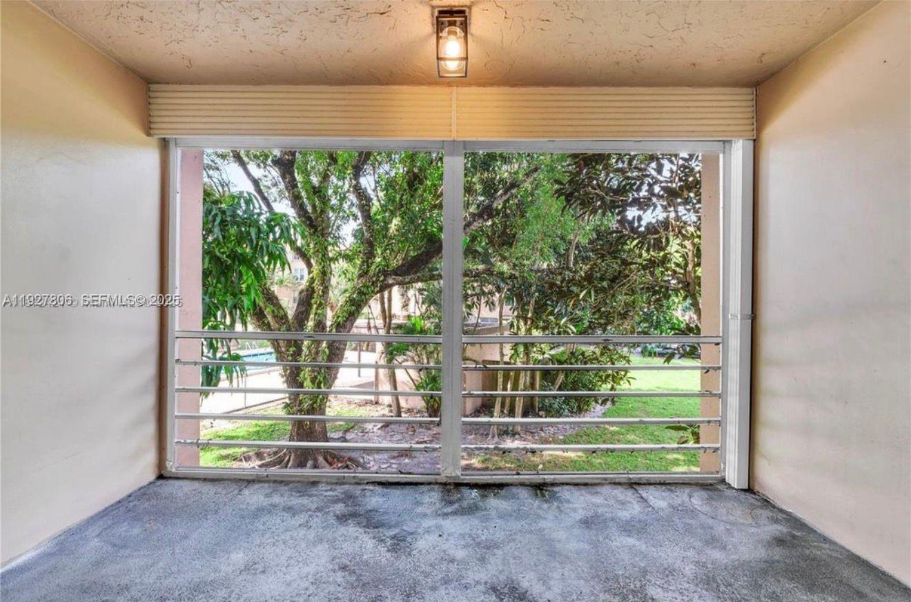 9431 Live Oak Place, Unit 205 Davie, FL 33324 - Photo 12 of 13 a view of outdoor space and balcony