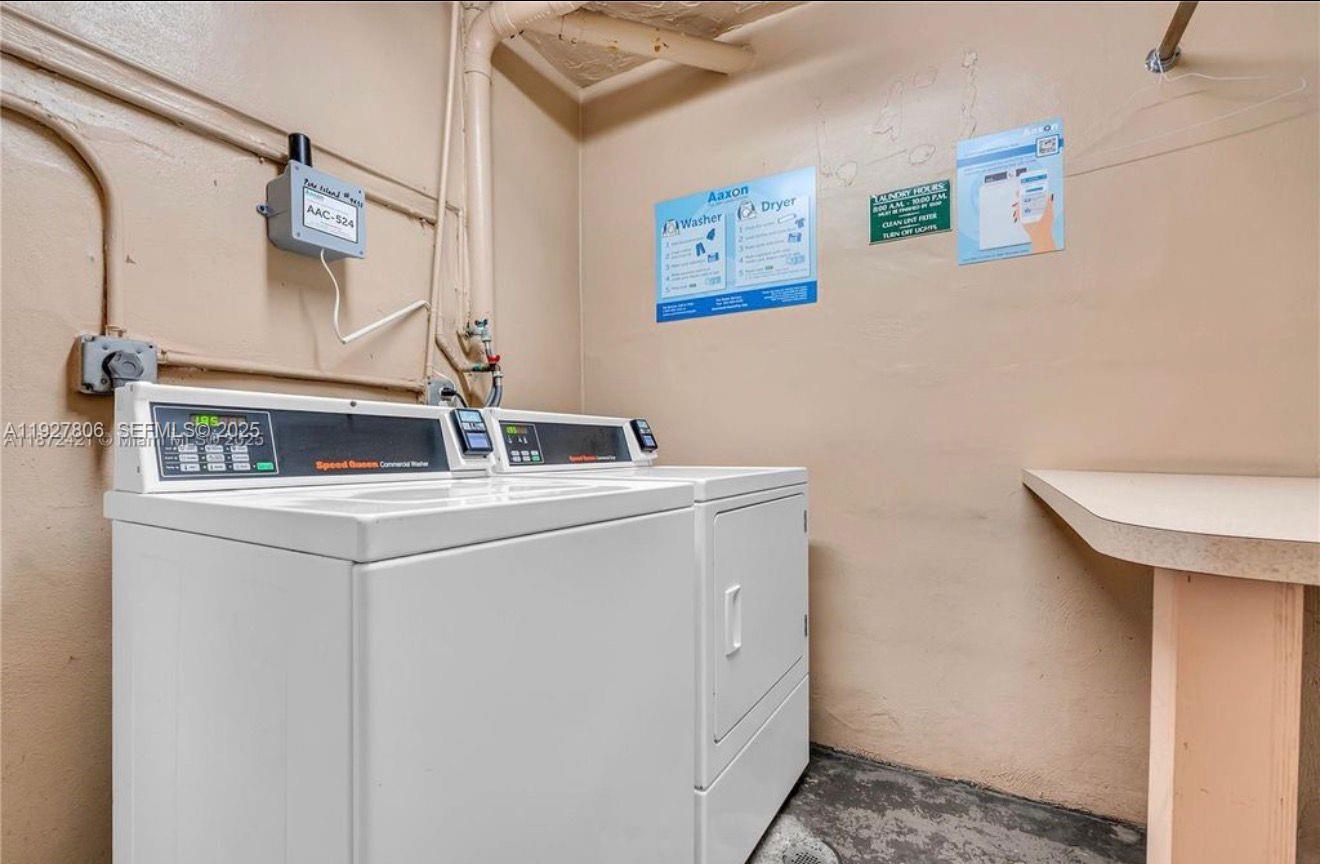 9431 Live Oak Place, Unit 205 Davie, FL 33324 - Photo 13 of 13 a utility room with dryer and washer