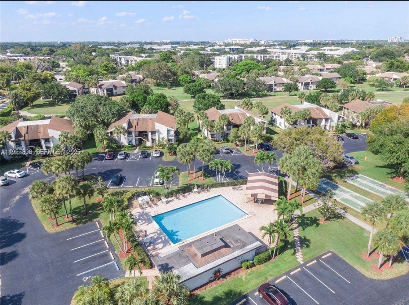 9431 Live Oak Place, Unit 205 Davie, FL 33324 - Photo 10 of 13 an aerial view of a house with a garden