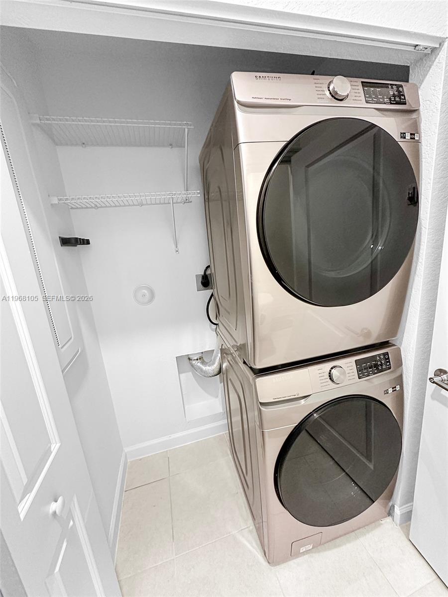 13402 Southwest 286th Street, Unit 13402 Homestead, FL 33033 - Photo 13 of 43 a utility room with dryer and washer