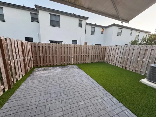 a front view of a house with a garage