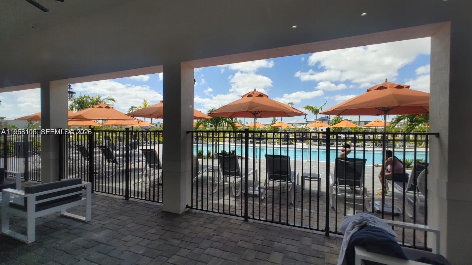13402 Southwest 286th Street, Unit 13402 Homestead, FL 33033 - Photo 39 of 43 a view of a balcony with an outdoor space