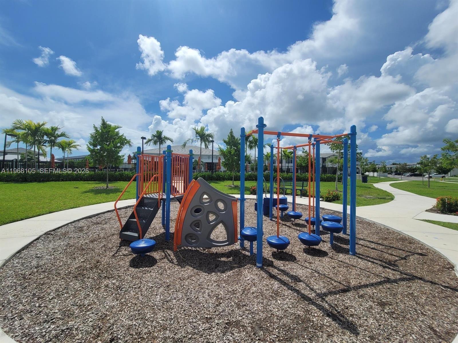 13402 Southwest 286th Street, Unit 13402 Homestead, FL 33033 - Photo 42 of 43 a view of a park with slide