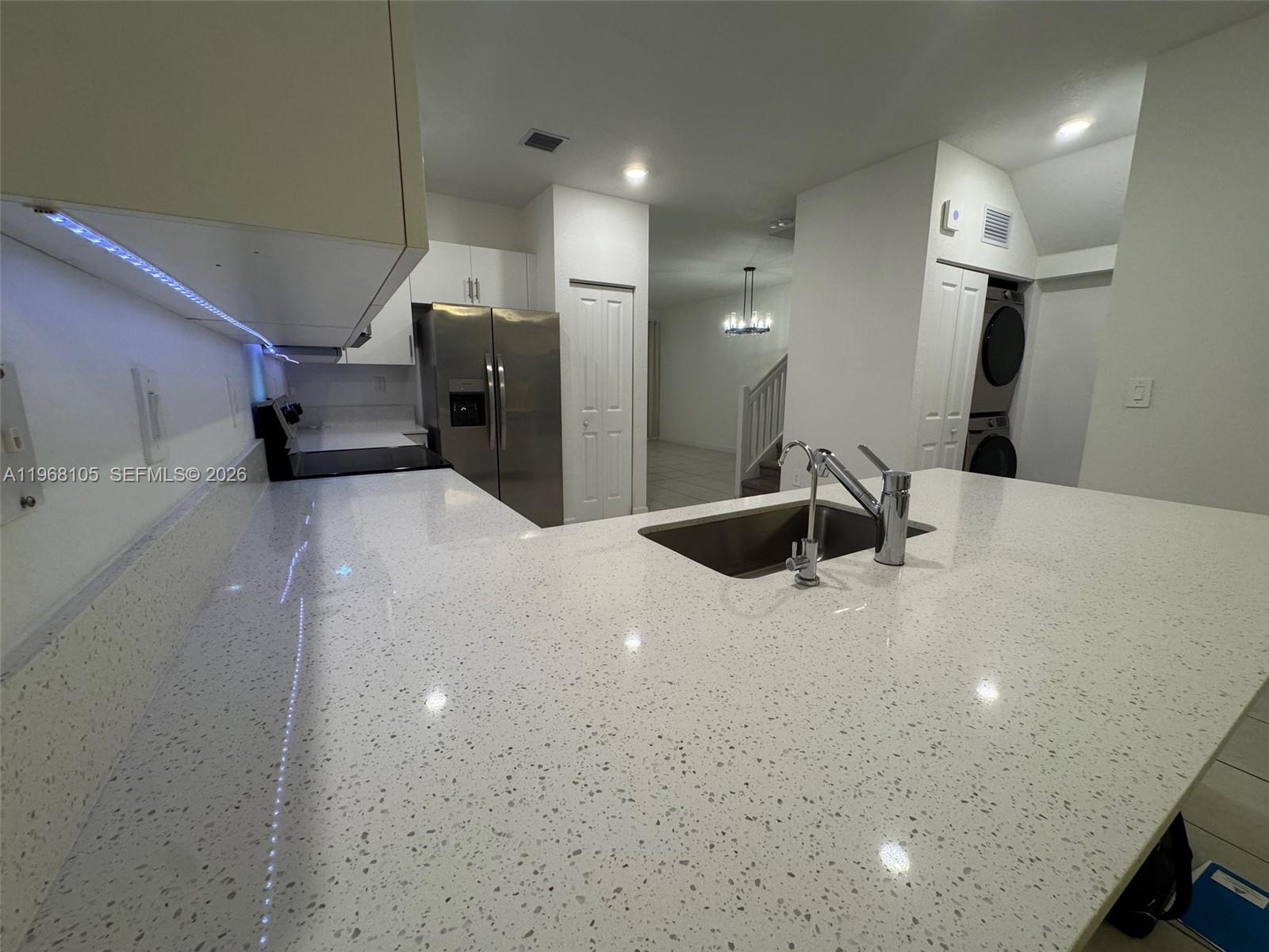 13402 Southwest 286th Street, Unit 13402 Homestead, FL 33033 - Photo 8 of 43 a large bathroom with a sink a toilet and mirror