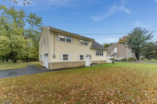 a house view with a garden space