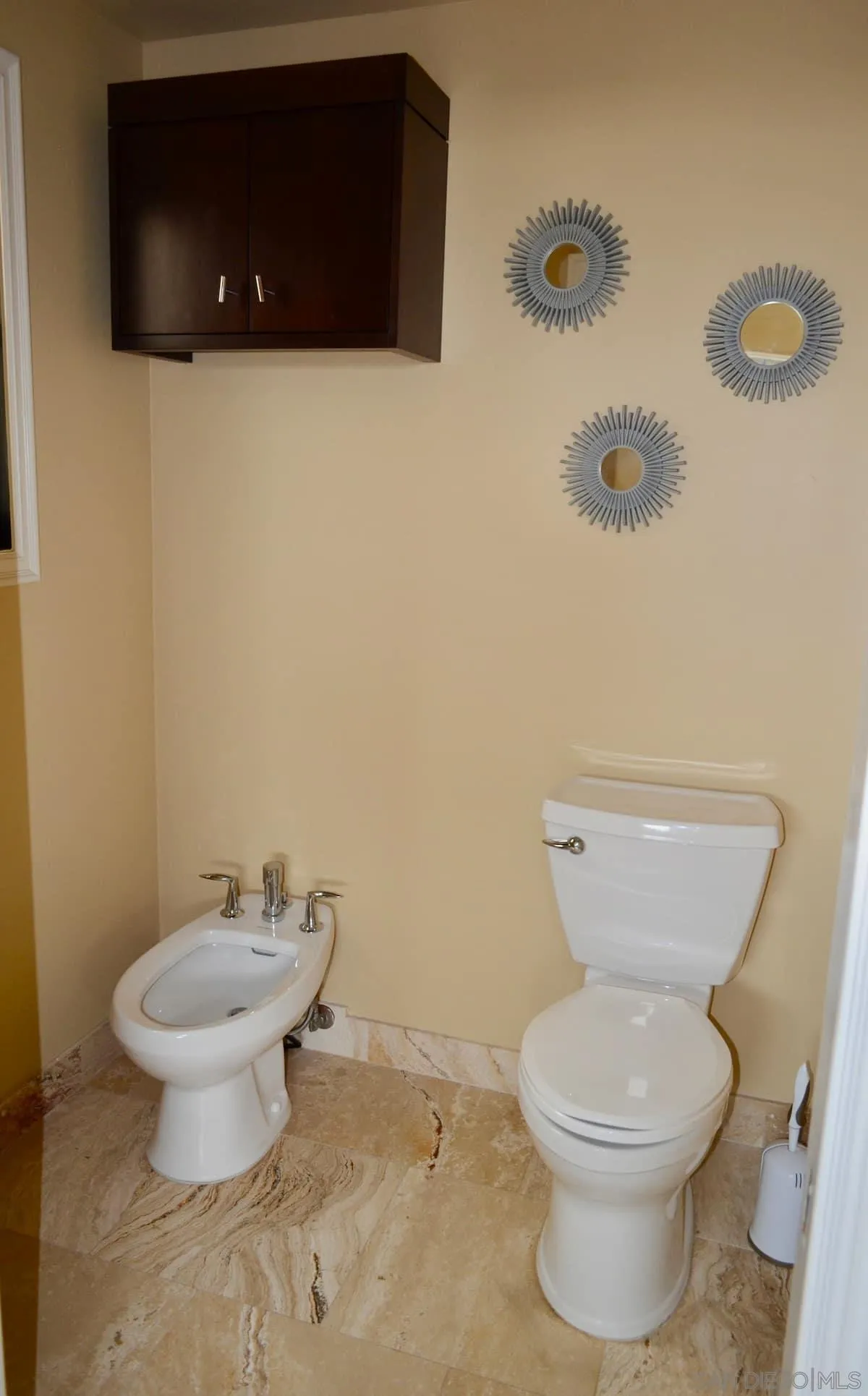 1235 Neptune Avenue Encinitas, CA 92024 - Photo 27 of 32 a bathroom with a toilet and a sink