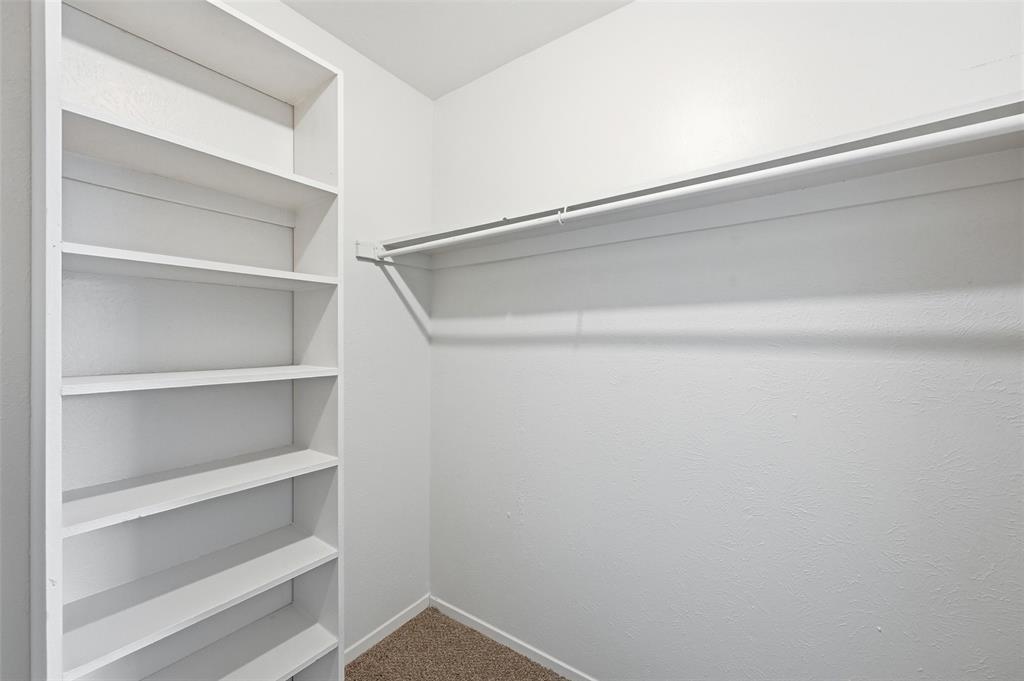 4851 Cedar Springs Road, Unit 189 Dallas, TX 75219 - Photo 20 of 29 a view of an empty walk in closet