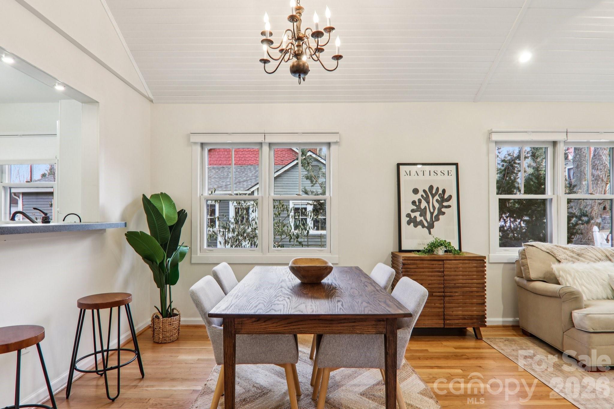 39 Short Street Asheville, NC 28801 - Photo 12 of 39 a view of a dining room with furniture window and wooden floor