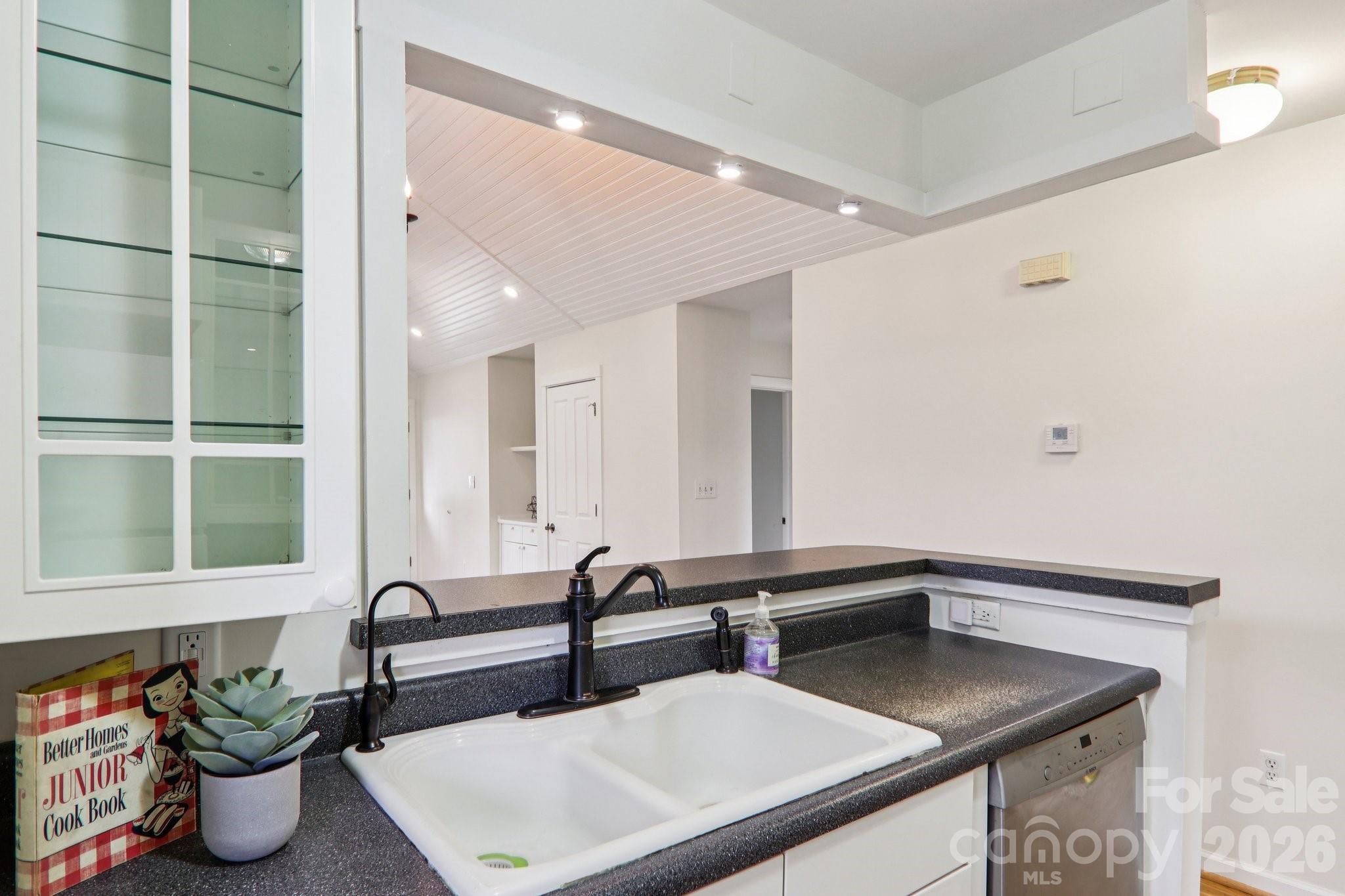 39 Short Street Asheville, NC 28801 - Photo 16 of 39 a view of front door and wooden floor