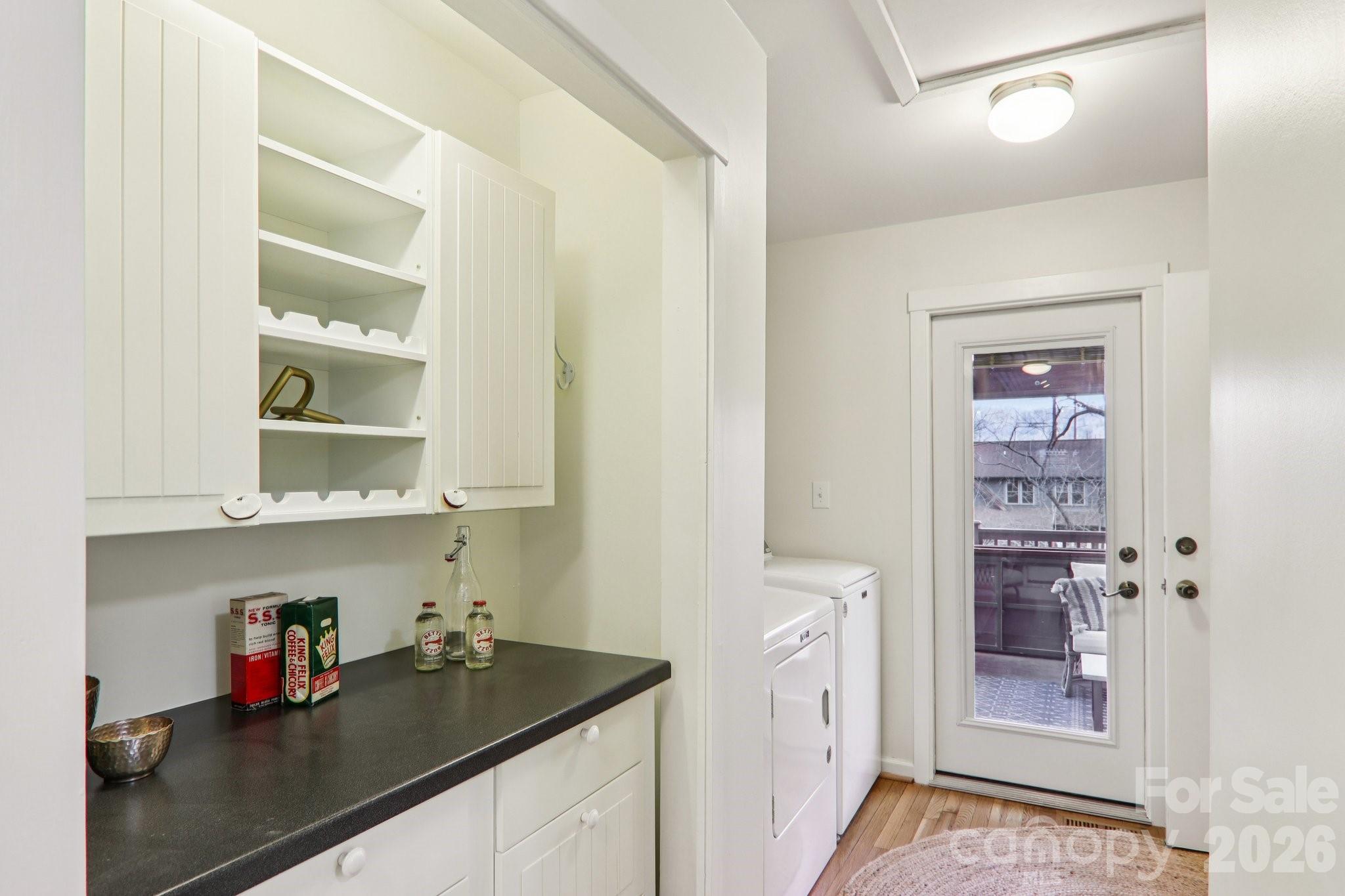 39 Short Street Asheville, NC 28801 - Photo 18 of 39 a kitchen with a sink and cabinets