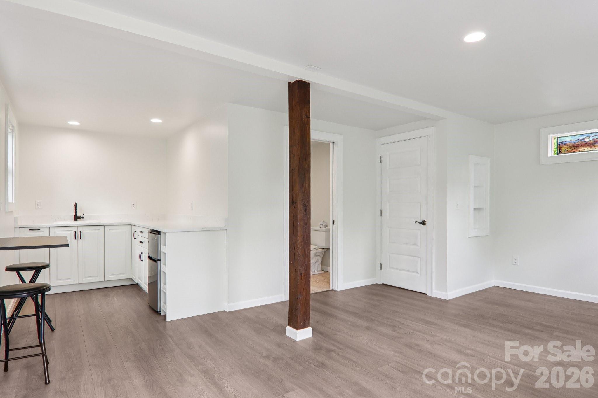 39 Short Street Asheville, NC 28801 - Photo 27 of 39 a view of hallway with wooden floor