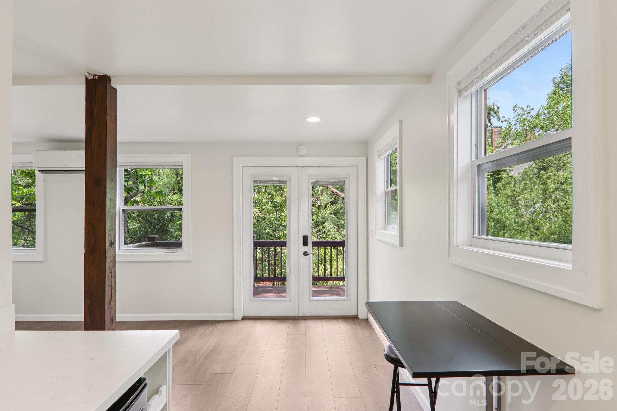 39 Short Street Asheville, NC 28801 - Photo 30 of 39 a view of an empty room with a window