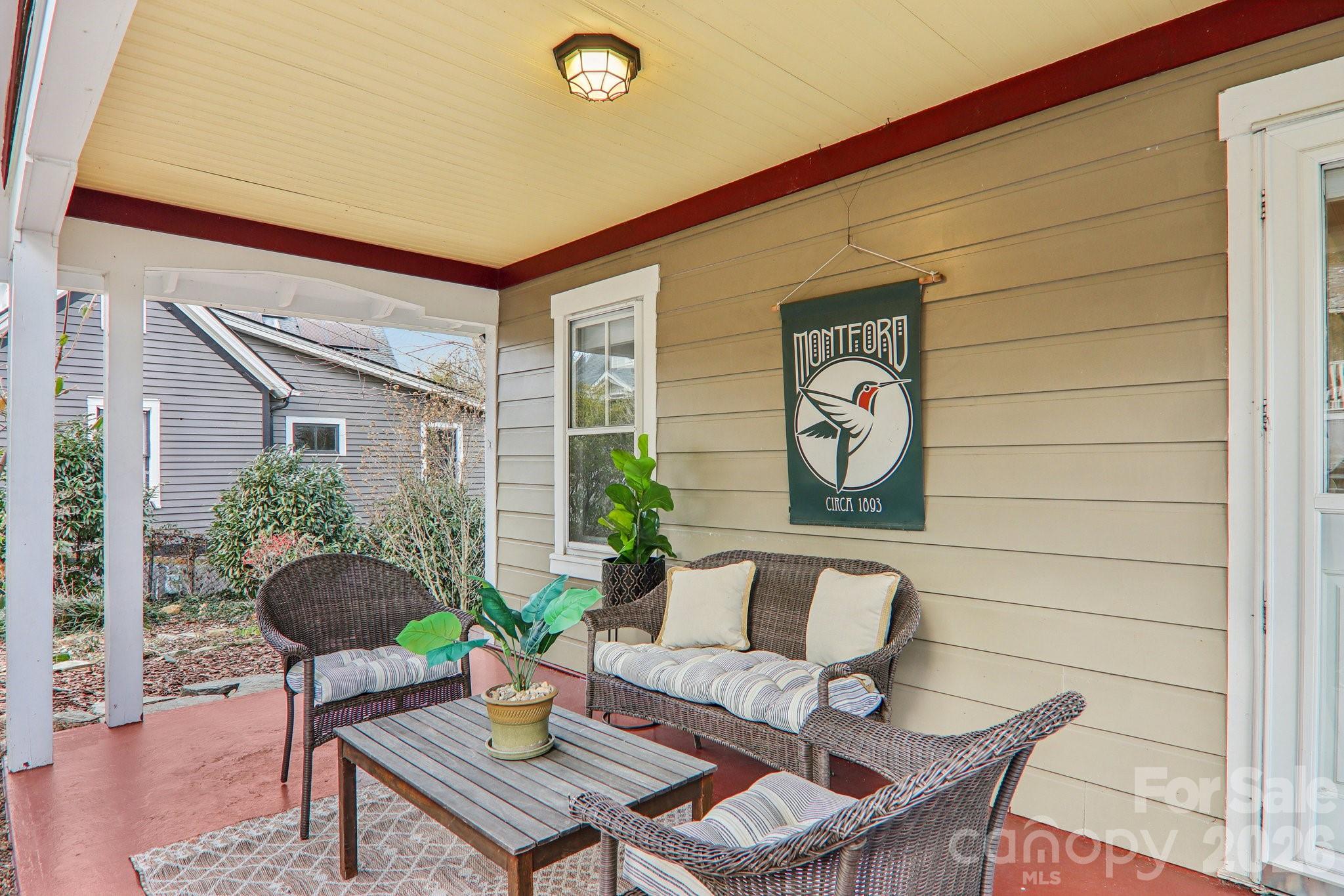 39 Short Street Asheville, NC 28801 - Photo 5 of 39 a outdoor living space with furniture and potted plant
