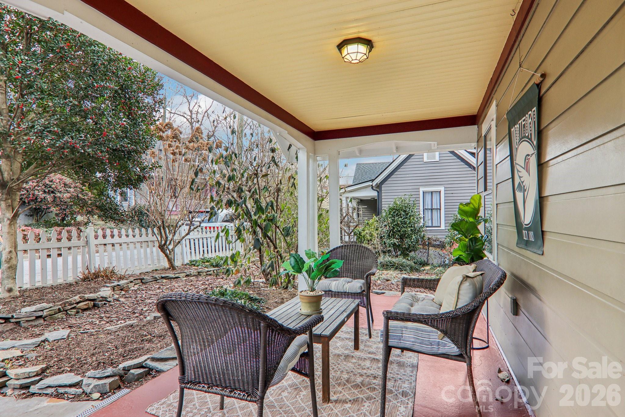 39 Short Street Asheville, NC 28801 - Photo 6 of 39 a view of a house with backyard and sitting area