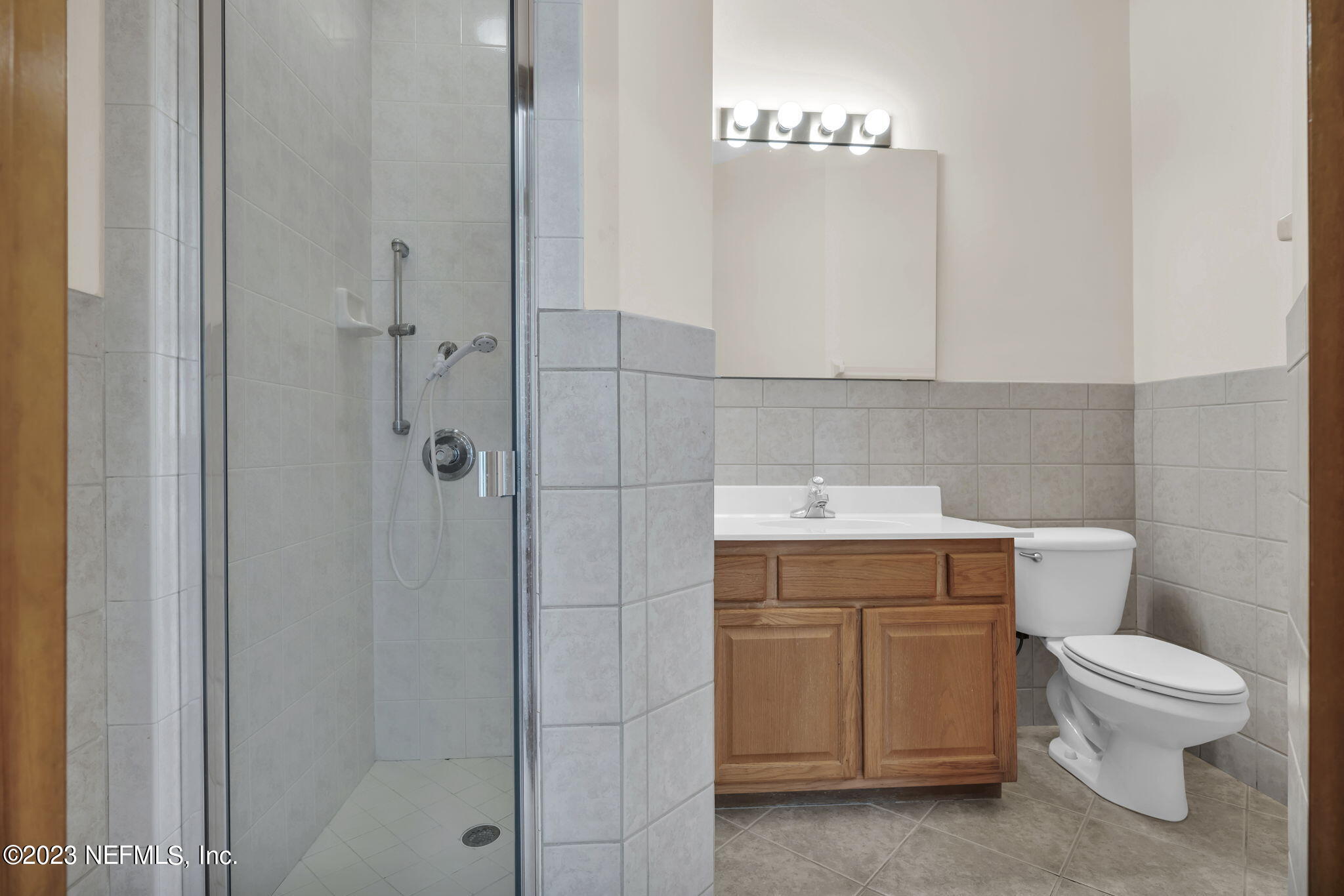 1387 Lee Road St. Johns, FL 32259 - Photo 27 of 62 a bathroom with a toilet a sink and a shower