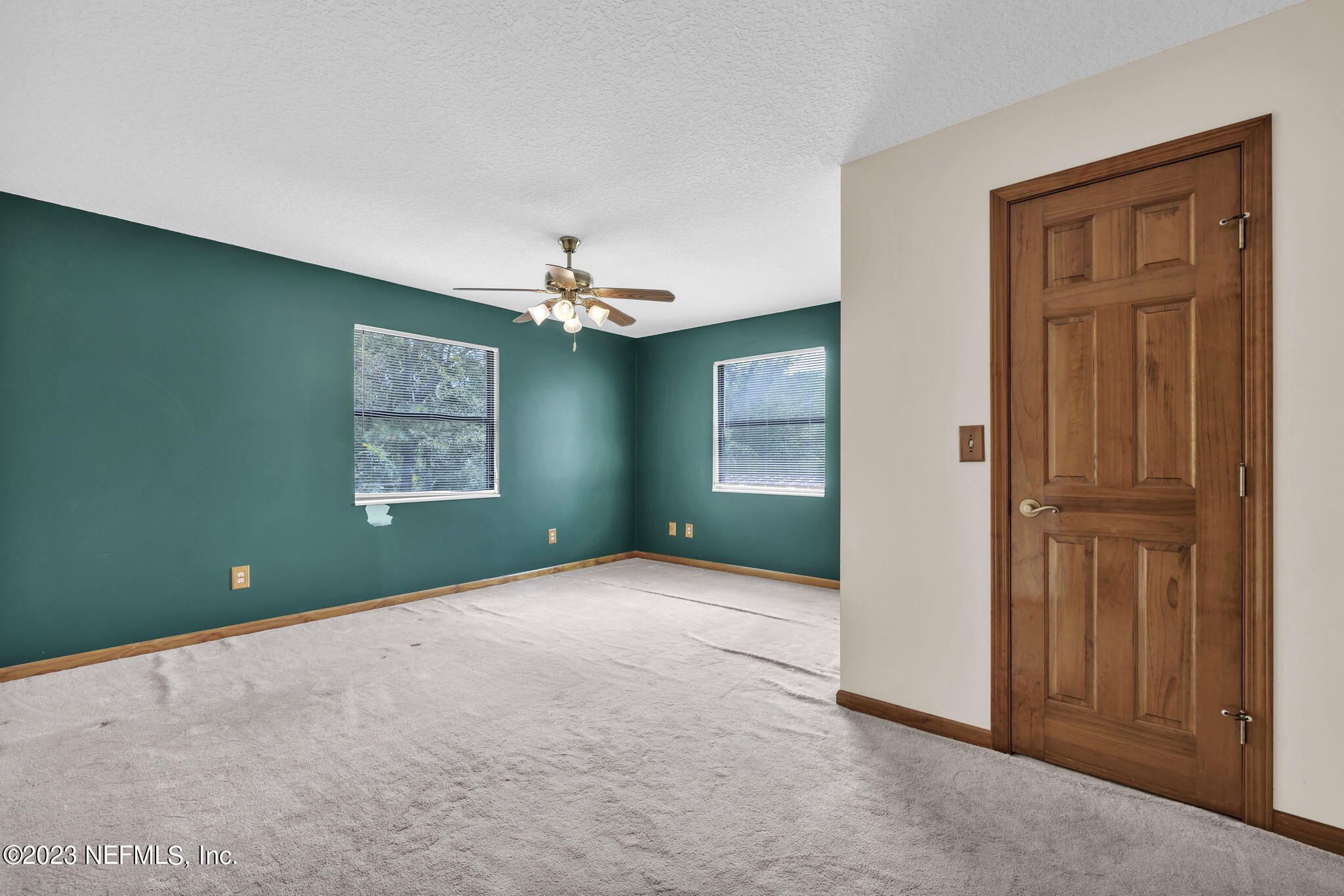 1387 Lee Road St. Johns, FL 32259 - Photo 34 of 62 an empty room with windows and closet