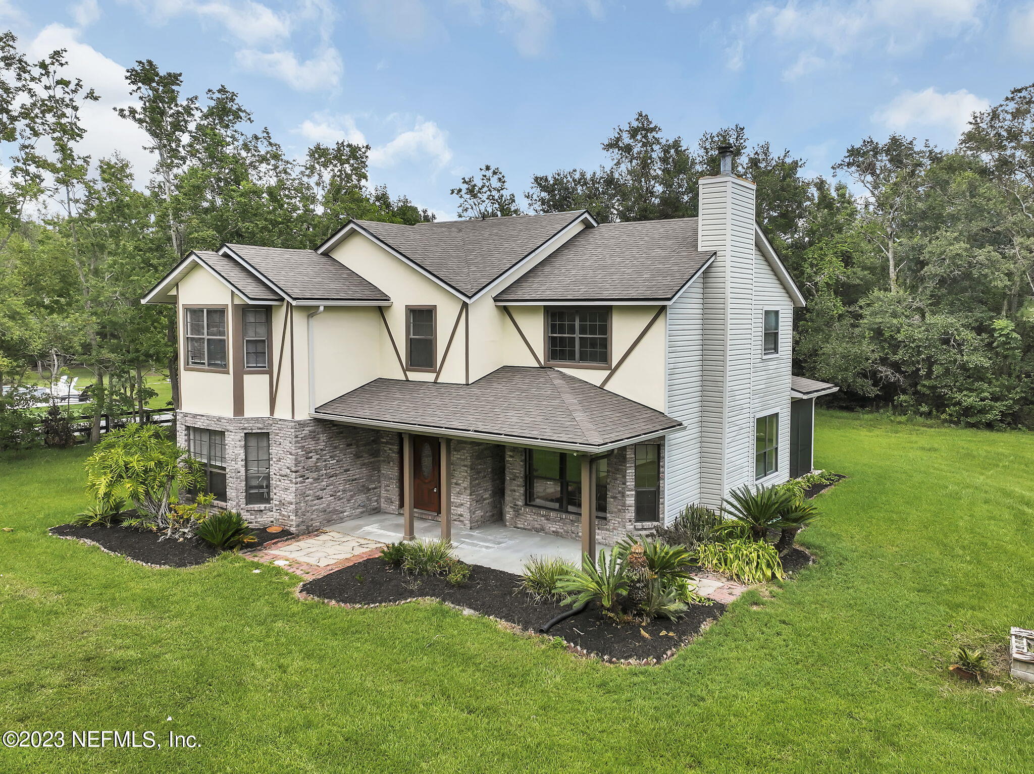 1387 Lee Road St. Johns, FL 32259 - Photo 4 of 62 a front view of a house with a yard