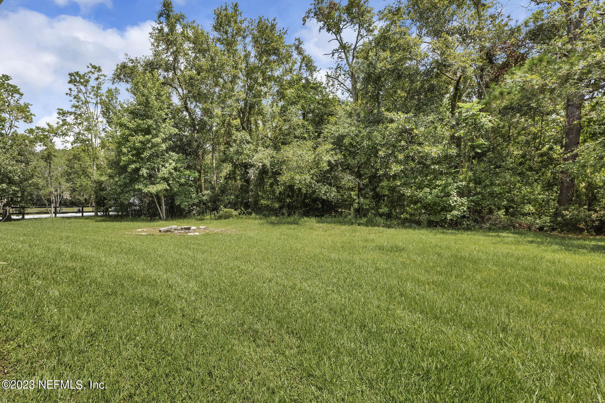 1387 Lee Road St. Johns, FL 32259 - Photo 41 of 62 a view of outdoor space with deck and yard