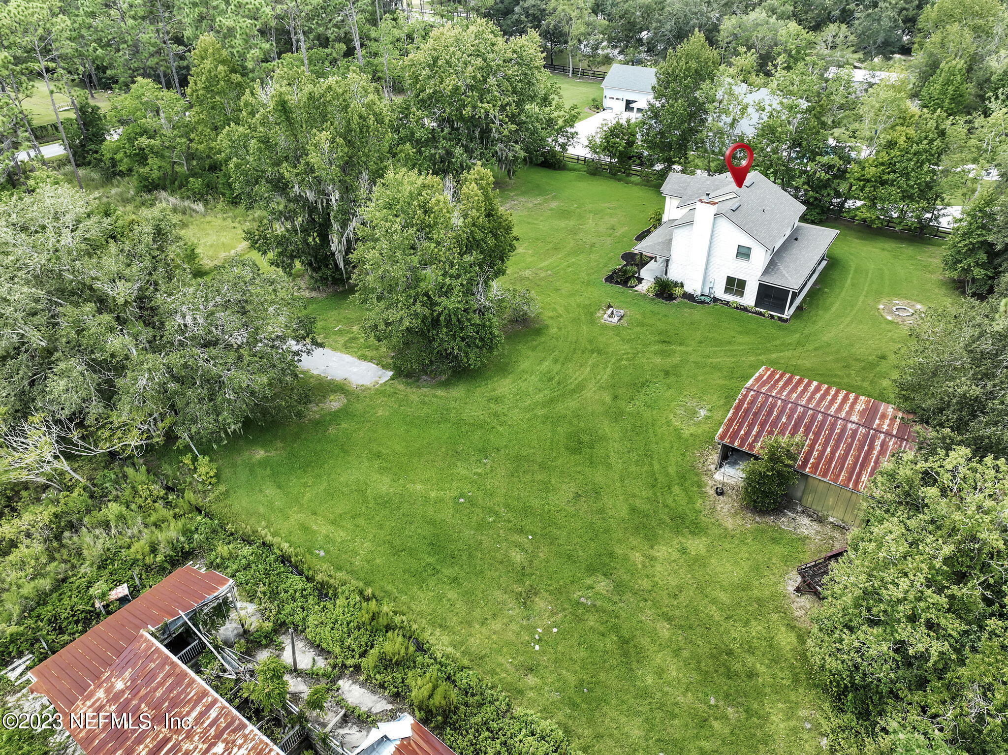 1387 Lee Road St. Johns, FL 32259 - Photo 42 of 62 a view of a house with a yard porch and sitting area