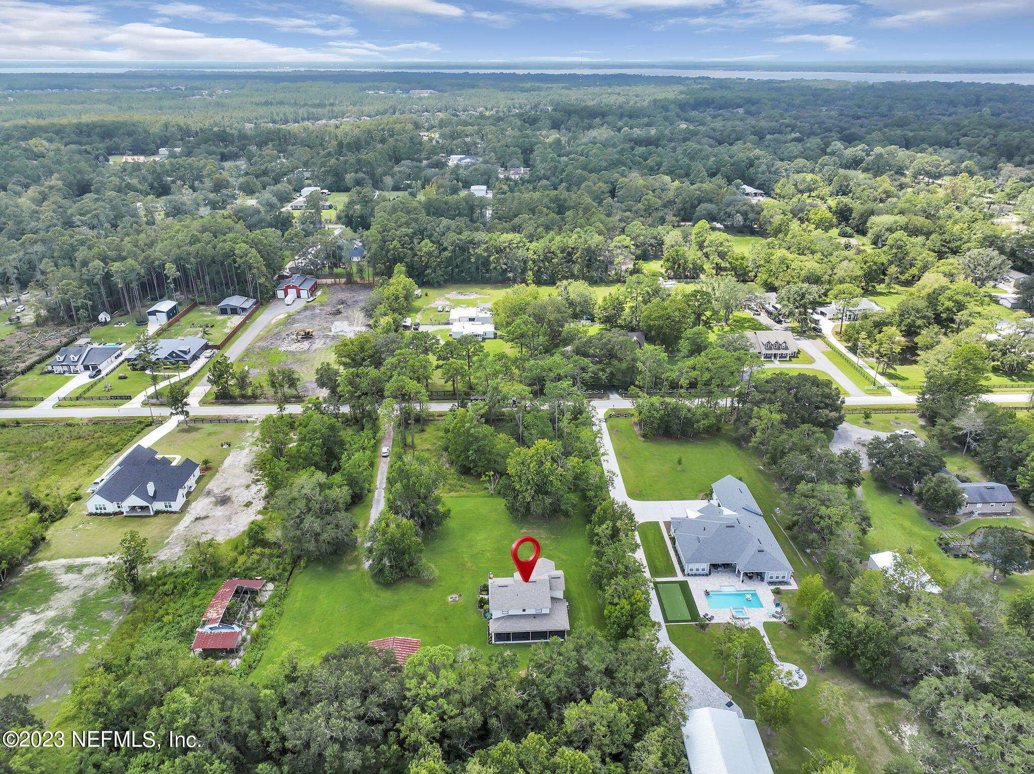 1387 Lee Road St. Johns, FL 32259 - Photo 46 of 62 an aerial view of residential house with outdoor space and trees