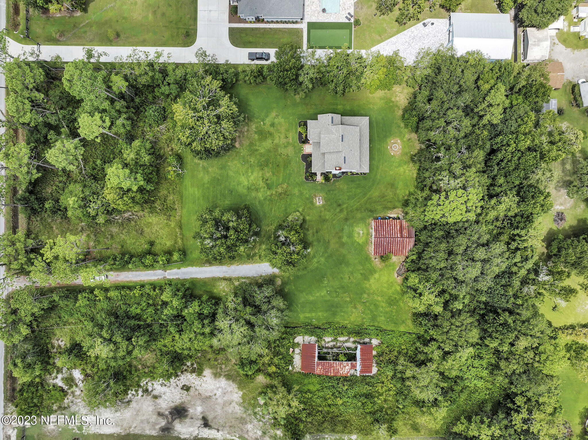 1387 Lee Road St. Johns, FL 32259 - Photo 52 of 62 an aerial view of a house with a yard
