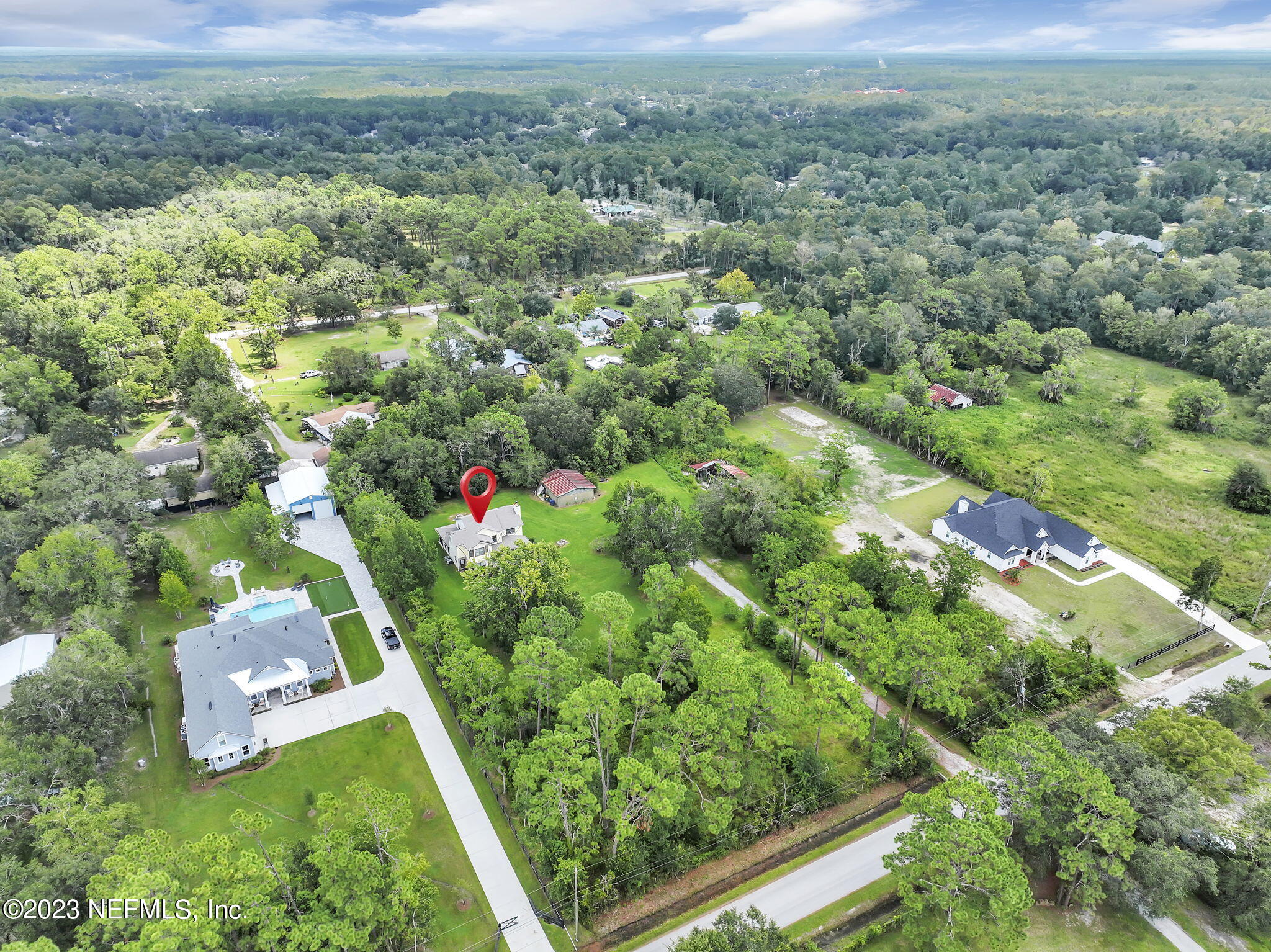 1387 Lee Road St. Johns, FL 32259 - Photo 54 of 62 an aerial view of residential houses with outdoor space and trees