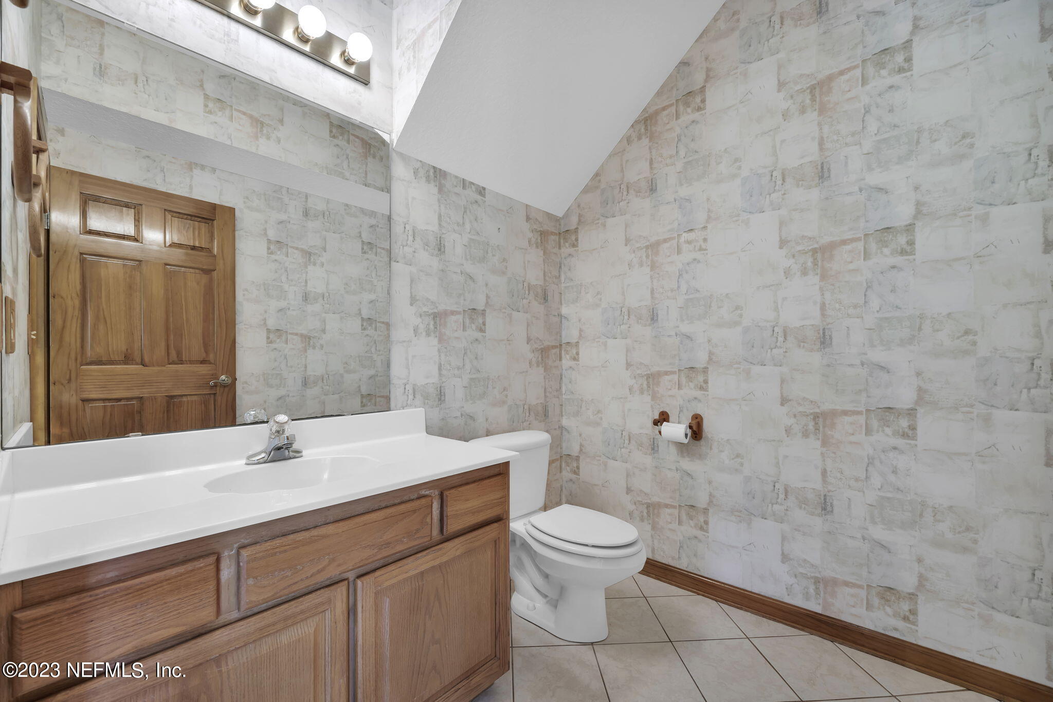 1387 Lee Road St. Johns, FL 32259 - Photo 10 of 62 a bathroom with a sink a toilet and shower