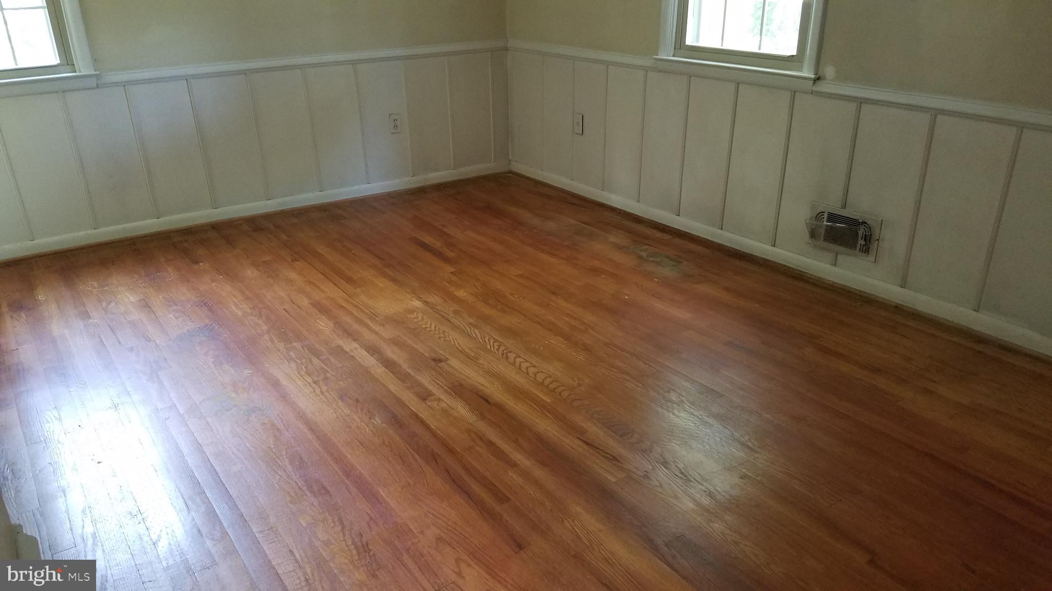 6909 Banbury Road Baltimore, MD 21239 - Photo 10 of 14 Master Bedroom with hardwood floor.