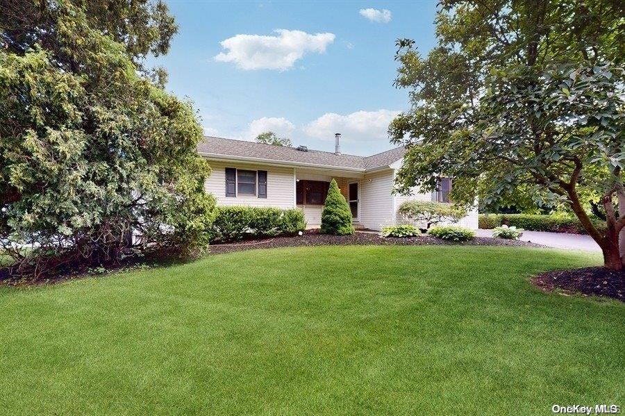 183 Beaver Dam Road Brookhaven, NY 11719 - Photo 1 of 1 a front view of house with yard and green space