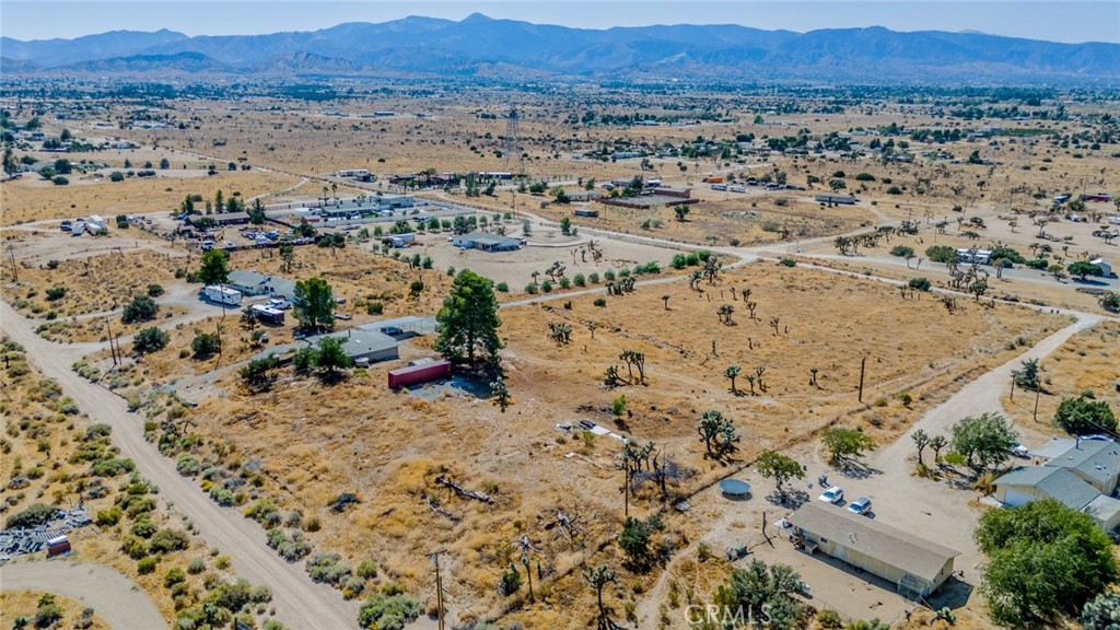 10601 Anderson Ranch Road Phelan, CA 92371 - Photo 15 of 18 an aerial view of residential house and sandy dunes