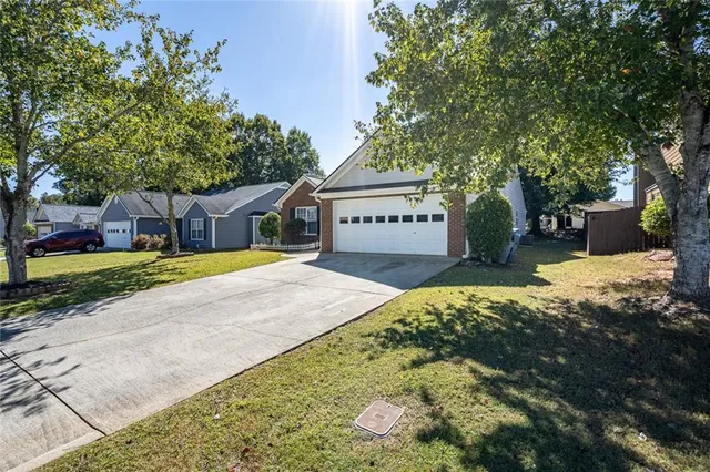 a view of swimming pool with a backyard