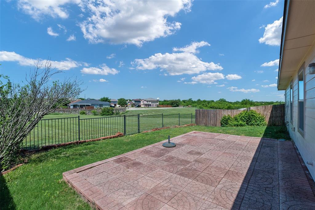 3917 Mantis Street Fort Worth, TX 76106 - Photo 21 of 22 a view of a park with large trees