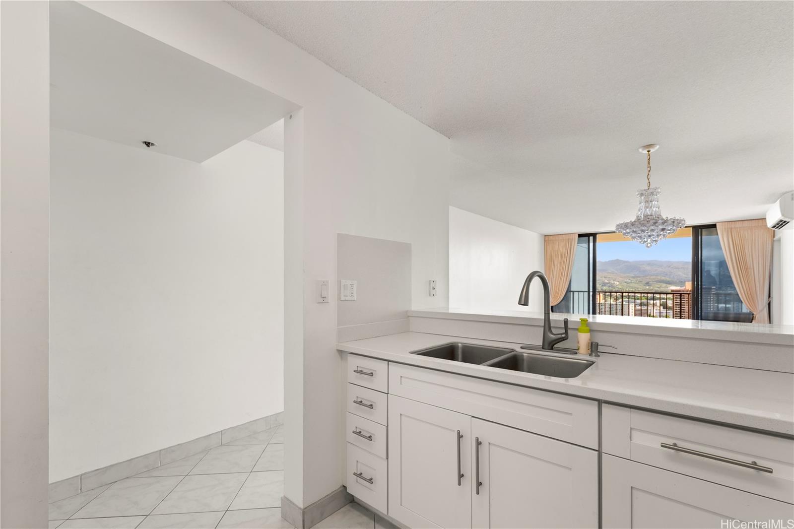 990 Ala Nanala Street, Unit 32C Honolulu, HI 96818 - Photo 8 of 24 Kitchen to Living Room