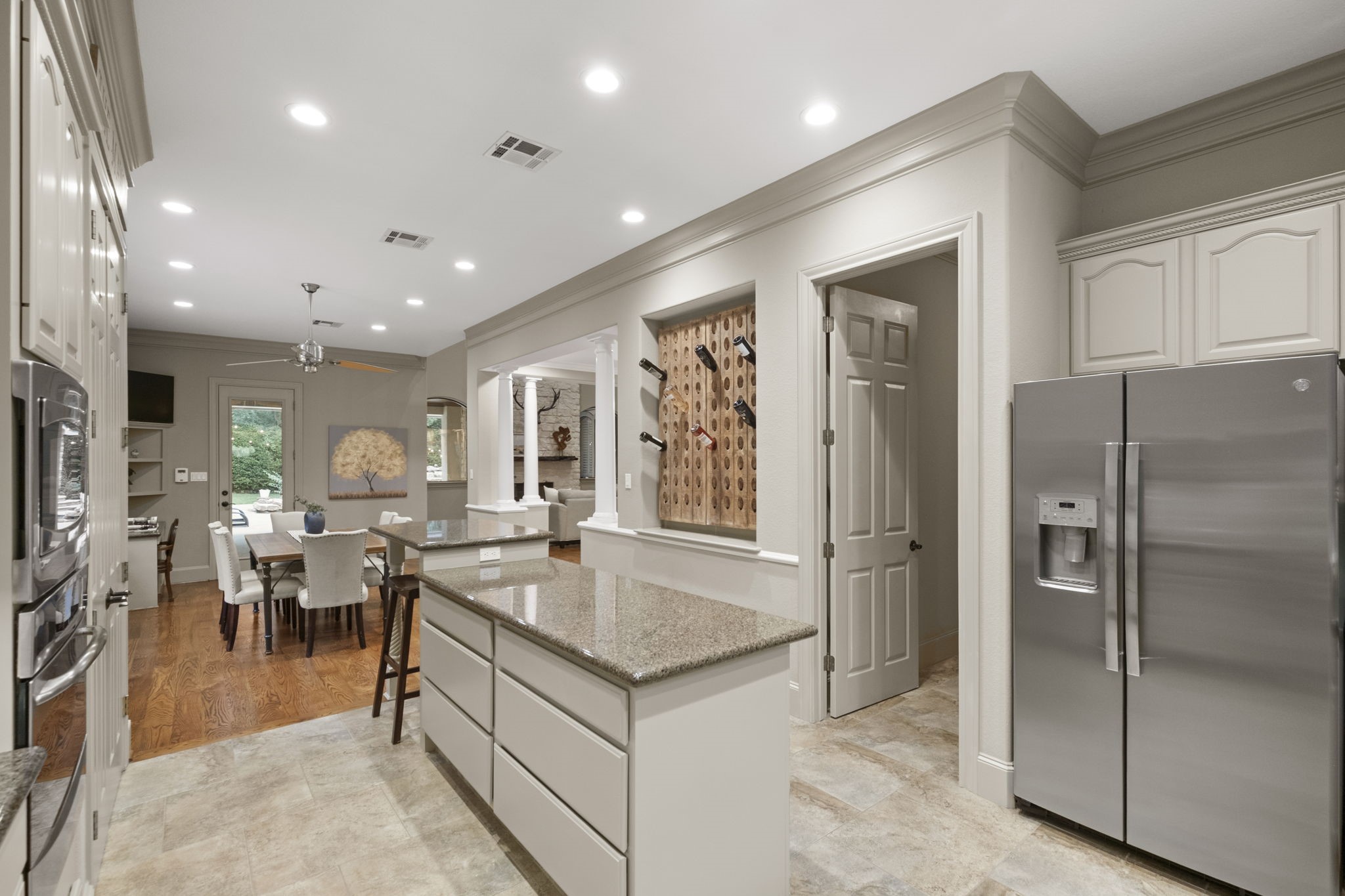 20010 Timber Ridge Drive Magnolia, TX 77355 - Photo 16 of 50 This gourmet kitchen dazzles with sleek stainless steel appliances, ambient recessed lighting, and a spacious island with drawer storage. The open flow to the breakfast and dining areas make it easy to enjoy your company.