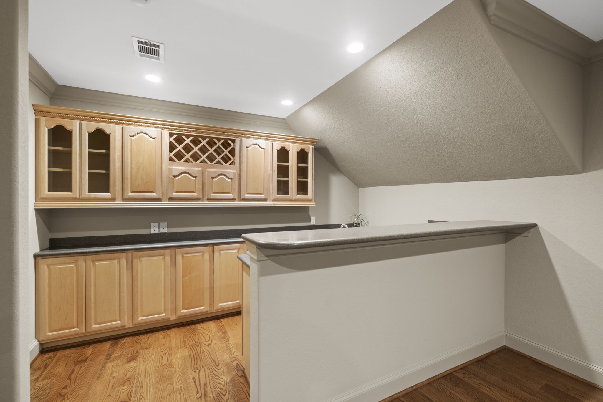 20010 Timber Ridge Drive Magnolia, TX 77355 - Photo 28 of 50 A separate wet bar makes entertaining effortless—ideal for hosting game nights or relaxing with a drink.